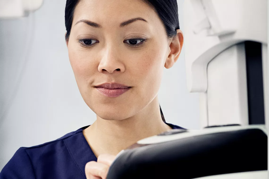 Lab technician extending the field light image